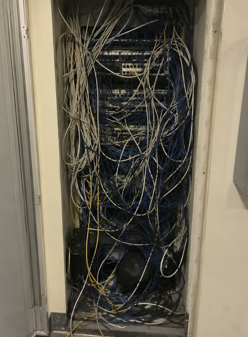Dirty and overcrowded riser closet